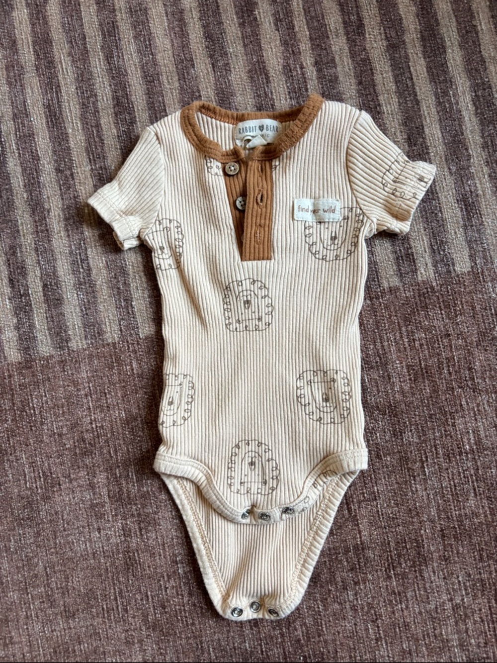Neutral Ribbed Short-Sleeve Baby One-Piece with Brown Trim